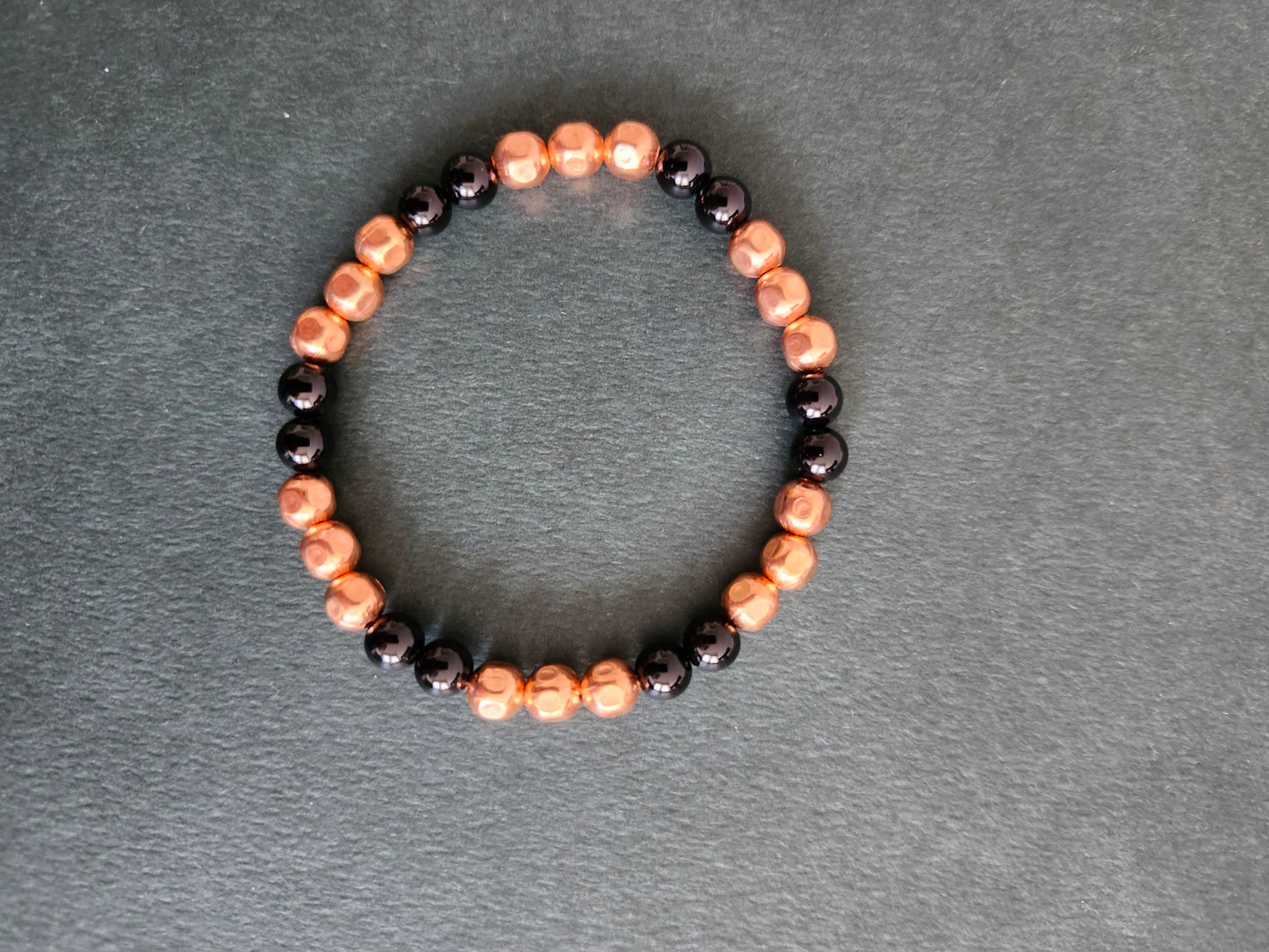 Copper Faceted Onyx 6mm